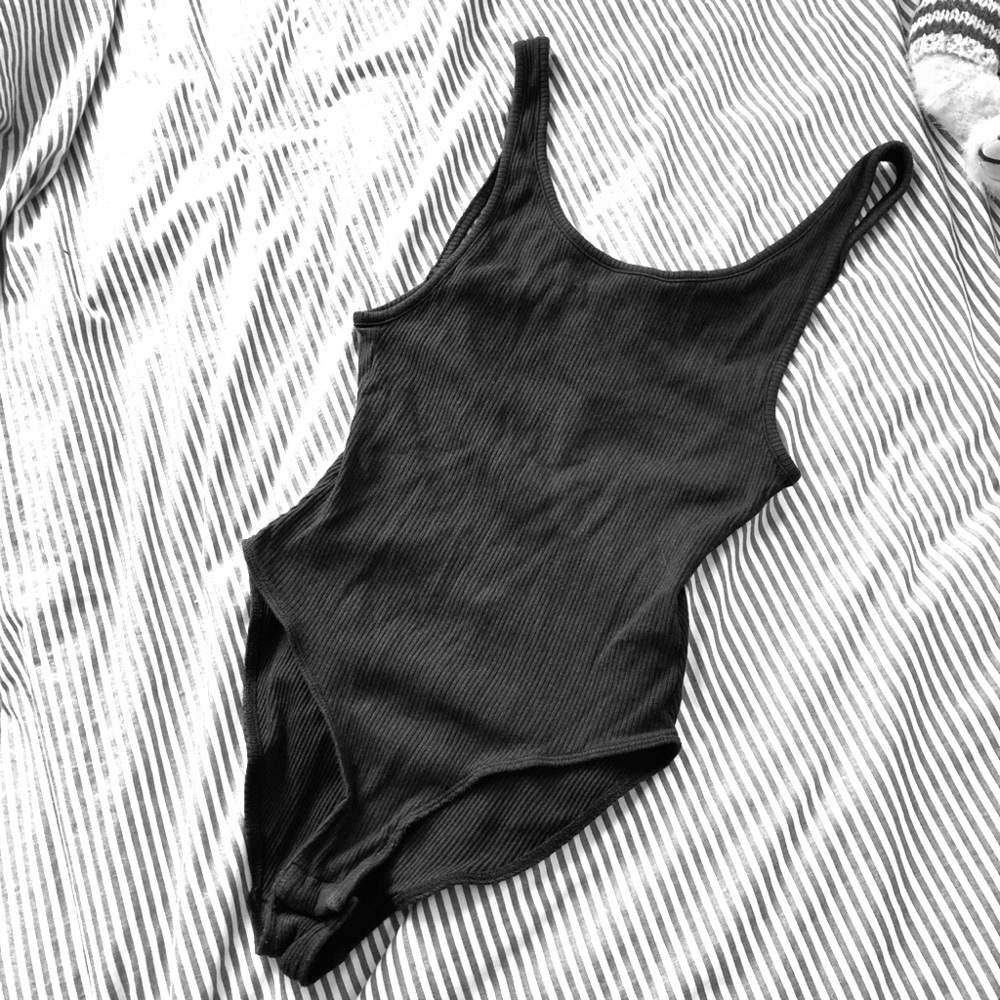 Out from under black bodysuit